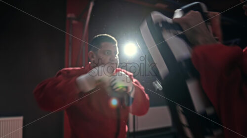 People boxing at a sport gym - Starpik Stock