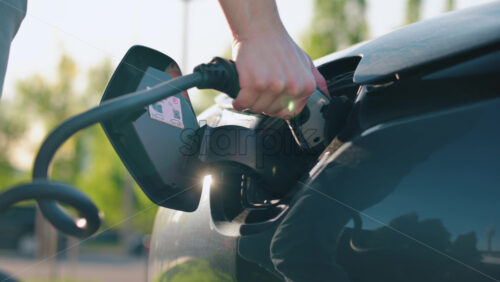 Video - Electric car charging stock video footage