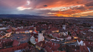 Aerial drone timelapse view of Sibiu at sunset, Romania - Starpik