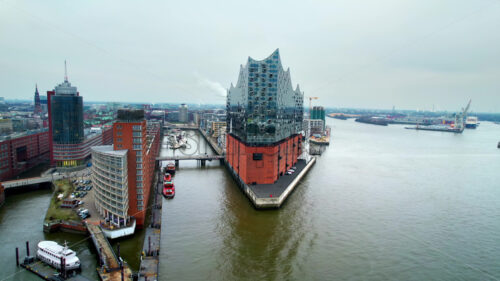 Aerial drone view of Hamburg city and port with harbour, Germany, Elbphilharmonie - Starpik