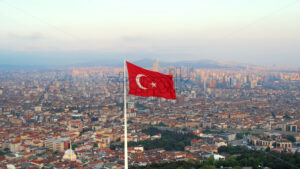 Aerial drone view of Istanbul at sunset, Turkey. Camlica Hill with national flags, greenery, cityscape on the background - Starpik