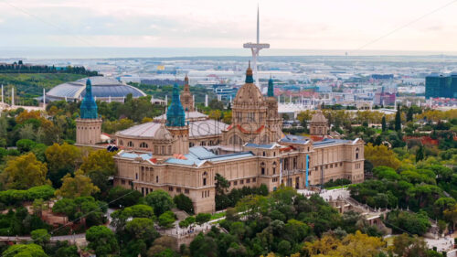 Aerial drone view of National Art Museum of Catalonia in Barcelona, Spain. Greenery around - Starpik