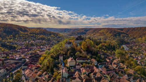 Aerial hyperlapse timelapse of Sighisoara city in autumn season. Romania - Starpik