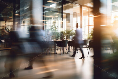 Blurred silhouettes of people in an office - Starpik