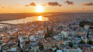 Premium stock video footage – Aerial drone hyperlapse view of Istanbul at sunset, Turkey. Multiple residential buildings around the Galata tower, nightlights, Golden Horn waterway on the background cinematic - Starpik Stock