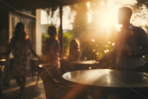 The blurred silhouettes of some people in a restaurant - Starpik