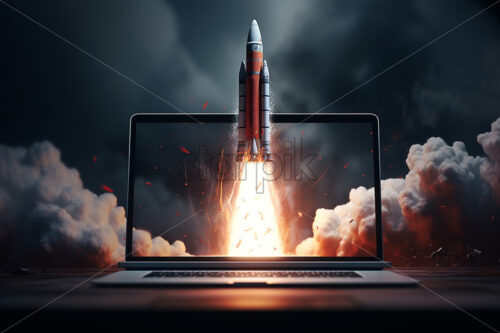 A rocket that takes off from a laptop - Starpik Stock