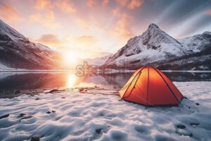 A tent on the shore of a frozen glacial lake - Starpik Stock