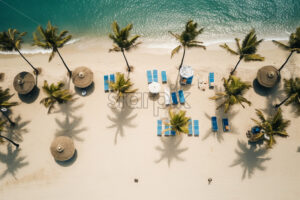 A tropical beach, with sand, umbrellas, palm trees - Starpik Stock