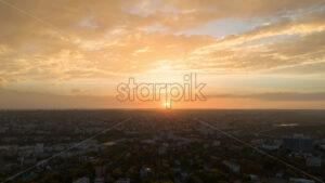 Aerial drone hyperlapse timelapse of sunset above Chisinau. Moldova - Starpik Stock