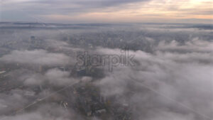 Aerial drone view of Chisinau city covered in fog. Moldova - Starpik Stock