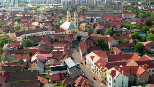 Aerial drone view of Oradea downtown, Romania. Cityscape with multiple historical buildings made in classic style - Starpik Stock