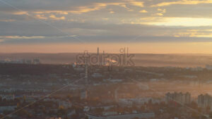 Aerial drone view of a thermal power station in Chisinau city at sunrise. Moldova - Starpik Stock