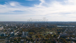 Aerial drone view of hyperlapse timelapse in Chisinau city. Late autumn, blue sky. Moldova - Starpik Stock