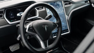 CHISINAU, MOLDOVA – JANUARY, 2022: Tesla Model S P90 interior. Steering wheel and displays showing information - Starpik