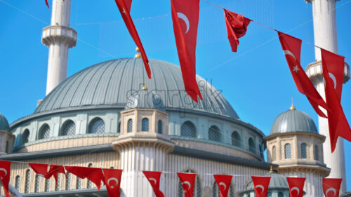 Camlica mosque with turkish flags, slow motion - Starpik Stock