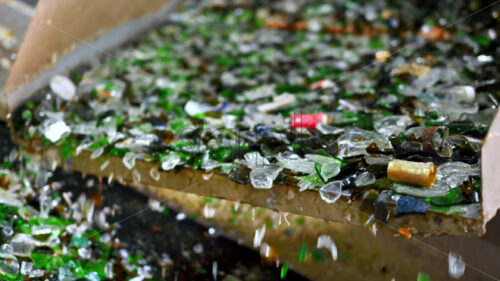 Video – Glass sorting line, small pieces vibrating, slow motion - Starpik Stock