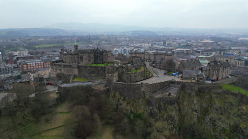 Aerial view of the Edinburgh Castle on Castle Rock with the city on the background, Scotland - Starpik Stock