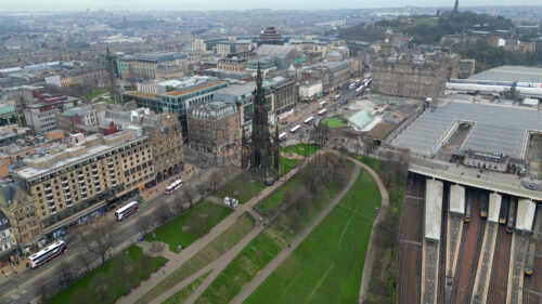 Aerial view of the Scott Monument near the Edinburgh Waverley with the city on the background Edinburgh, Scotland - Starpik Stock