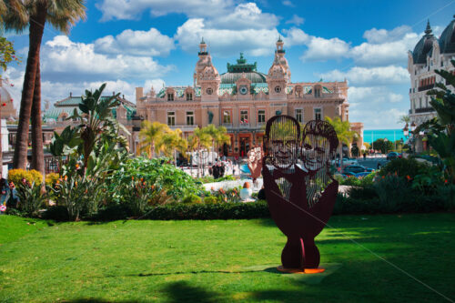 Man and woman sculpture in front of The Monte Carlo Casino - Starpik Stock