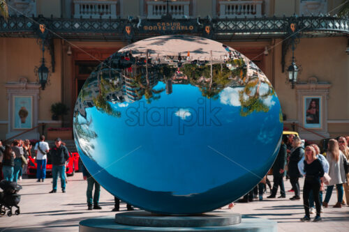 Sky mirror sculpture in front of The Monte Carlo Casino - Starpik Stock