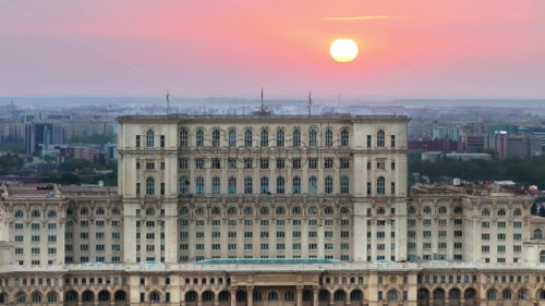 Video Aerial drone view of the Palace of Parliament in Bucharest, Romania at sunset - Starpik Stock