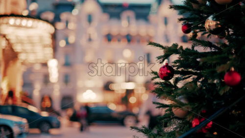 Video Close up of decorations on a Christmas tree in front of the Monte Carlo Casino in Monaco in the evening - Starpik Stock
