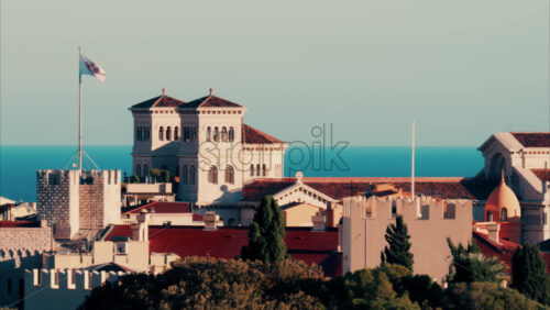 Video Distant aerial view of the Prince's Palace in the skyline of Monaco with the sea on the background