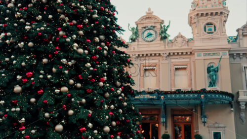 Video Monte Carlo , Monaco -December 23, 2024: Decorations on a Christmas tree in front of the Monte Carlo Casino