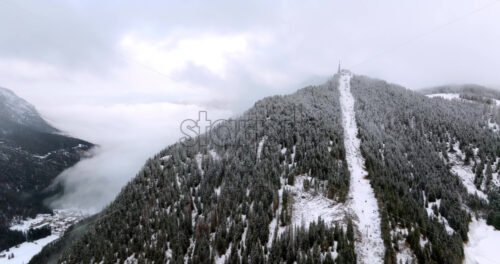Aerial drone view of a ski lift in Corvara, in South Tyrol, the Dolomites - Starpik Stock
