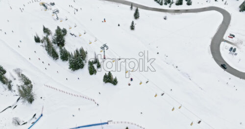 Aerial drone view of a ski lift in Corvara, in South Tyrol, the Dolomites - Starpik Stock
