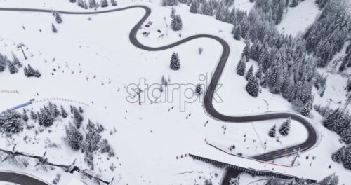 Aerial drone view of a ski lift in Corvara, in South Tyrol, the Dolomites - Starpik Stock