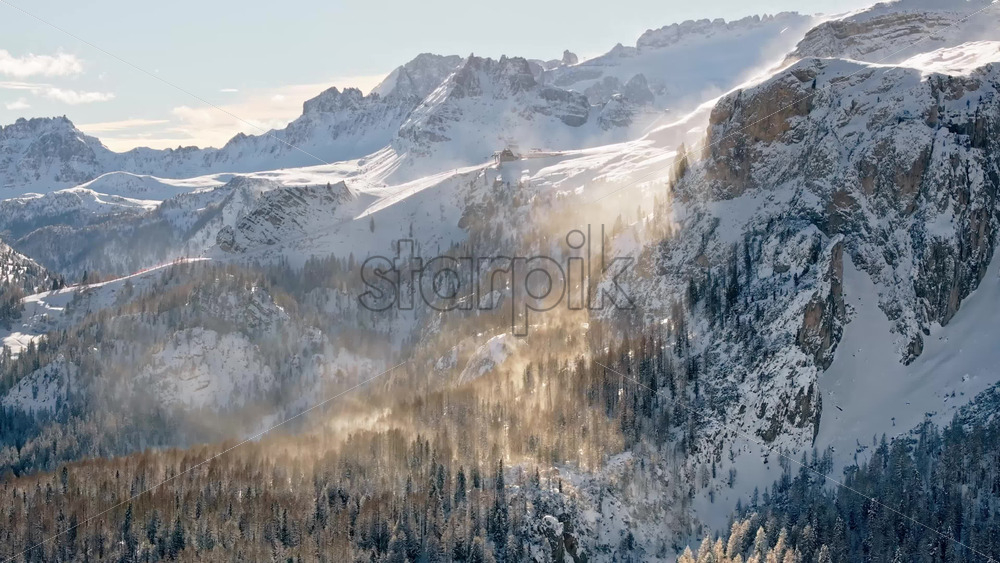 Aerial drone view of snow on the mountains in the Dolomites, Italy - Starpik Stock