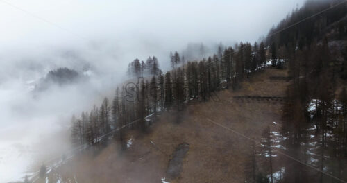 Aerial drone view of the Arabba mountain village in the Dolomites, Italy - Starpik Stock