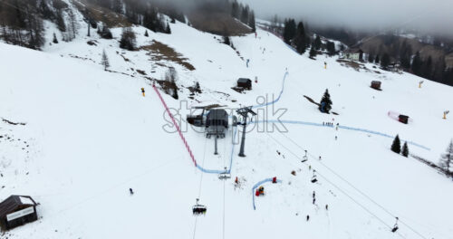 Aerial drone view of the Arabba ski resort in the Dolomites, Italy - Starpik Stock