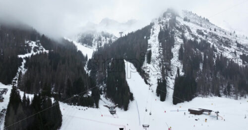 Aerial drone view of the Arabba ski resort in the Dolomites, Italy - Starpik Stock