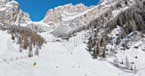 Aerial drone view of the Colfosco ski resort in South Tyrol, Dolomites, Northern Italy - Starpik Stock