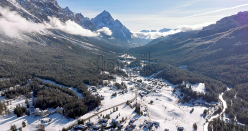 Aerial drone view of the Cortina d’Ampezzo town in the Dolomites, Italy - Starpik Stock