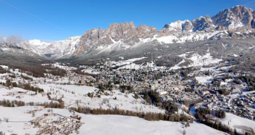 Aerial drone view of the Cortina d’Ampezzo town in the Dolomites, Italy - Starpik Stock