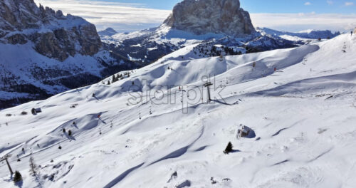 Aerial drone view of the Gardena Pass high mountain pass in the Dolomites, Italy - Starpik Stock