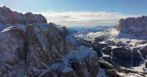 Aerial drone view of the Gardena Pass high mountain pass in the Dolomites, Italy - Starpik Stock