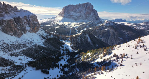 Aerial drone view of the Gardena Pass high mountain pass in the Dolomites, Italy - Starpik Stock