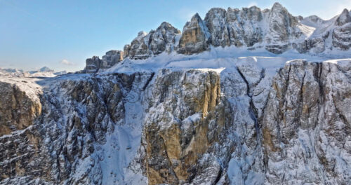 Aerial drone view of the Gardena Pass high mountain pass in the Dolomites, Italy - Starpik Stock