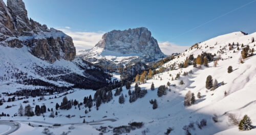 Aerial drone view of the Gardena Pass high mountain pass in the Dolomites, Italy - Starpik Stock
