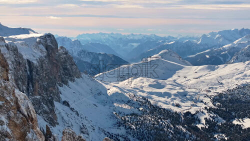 Aerial drone view of the Gardena Pass high mountain pass in the Dolomites, Italy - Starpik Stock