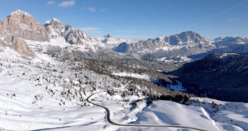 Aerial drone view of the Giau Pass high mountain pass in the Dolomites, Italy - Starpik Stock