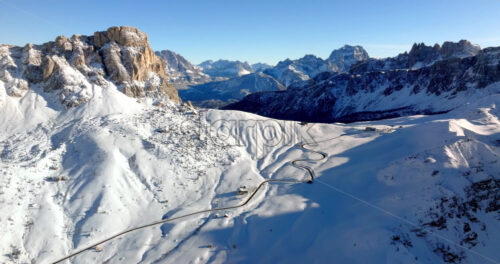 Aerial drone view of the Giau Pass high mountain pass in the Dolomites, Italy - Starpik Stock