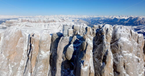 Aerial drone view of the Marmolada mountain in the Dolomites, northeastern Italy with the blue sky on the background - Starpik Stock