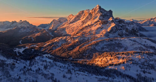 Aerial drone view of the Mountain Pelmo in the Dolomites, Italy at sunrise - Starpik Stock