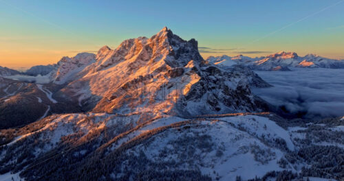 Aerial drone view of the Mountain Pelmo in the Dolomites, Italy at sunrise - Starpik Stock